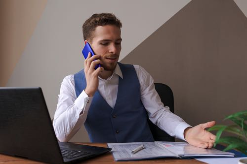 Business man on mobile phone